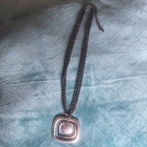 Mixed metals necklace with square pendants